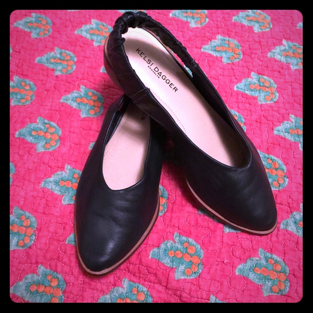 Navy leather sling back’s used with box.